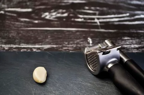 A composition of cloves of garlic on the table. Healthy eating. Stock Photos