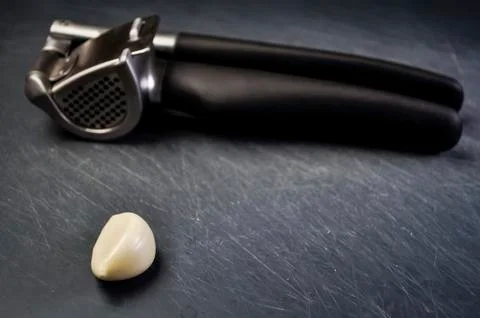 A composition of cloves of garlic on the table. Healthy eating. Stock Photos