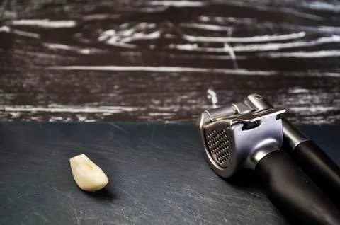 A composition of cloves of garlic on the table. Healthy eating. Stock Photos