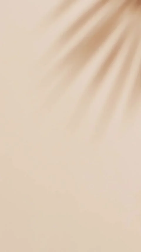 Composition of coconut halves with cocktail umbrellas over palm tree leaf on Stock Footage 342910750