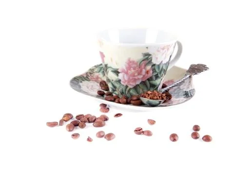 Composition of coffee beans, cups and spoons Stock Photos