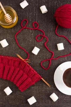 Composition with coffee, knitting and marsh-mallows Stock Photos