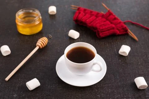 Composition with coffee, knitting and marsh-mallows Stock Photos