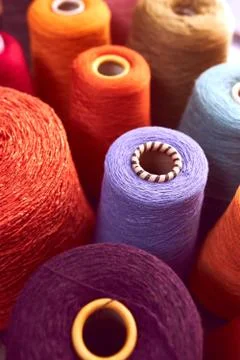 Composition of colorful vibrant wool threads Stock Photos