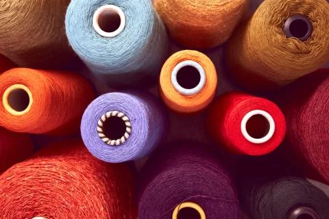 Composition of colorful vibrant wool threads Stock Photos