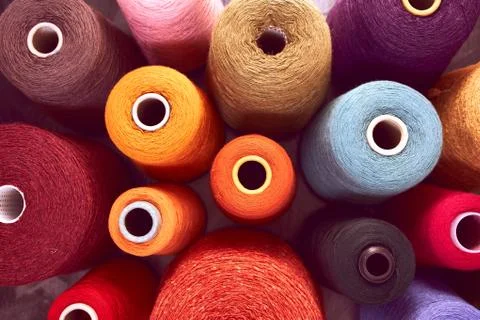 Composition of colorful vibrant wool threads Stock Photos