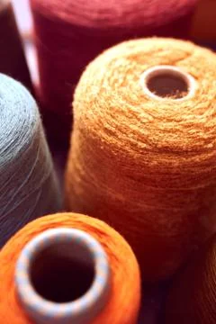 Composition of colorful vibrant wool threads Stock Photos