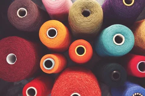 Composition of colorful vibrant wool threads Stock Photos
