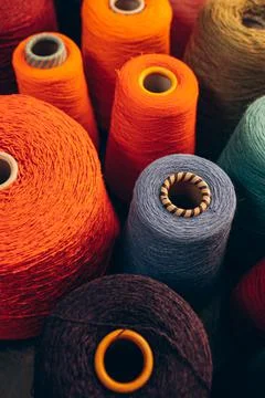 Composition of colorful vibrant wool threads from above. Stock Photos