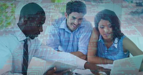 Composition of computer processor over business people using laptop 스톡 사진