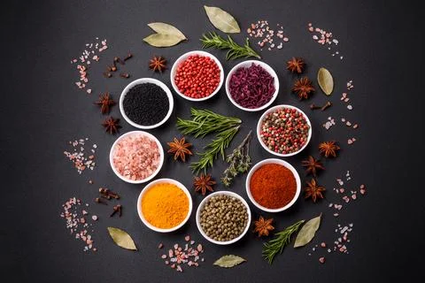 Composition consisting of a variation of several types of spices in white cer Foto stock