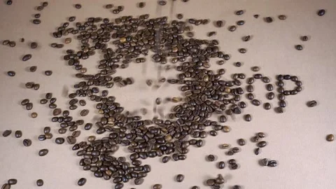Composition of a cup and the words coffee shop with falling roasted coffee beans Video stock 141143551