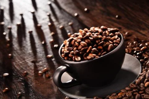 Composition with cup of coffee and beans. Foto stock