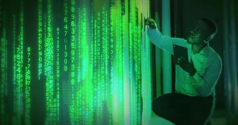 Composition of data processing over african american businessman using tablet in 写真素材