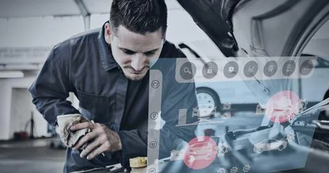 Composition of data processing over caucasian man looking at car engine in Stock Photos