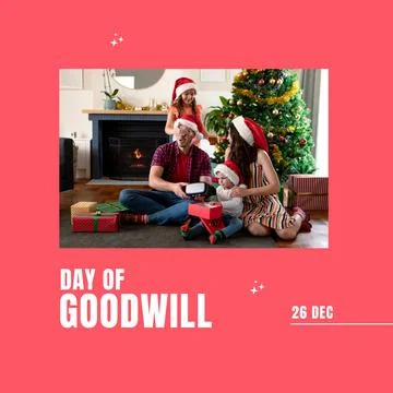Composition of day of goodwill text over biracial couple with children in santa Fotos Stock