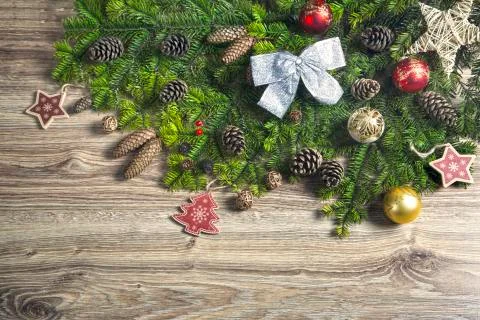 Composition with decorated Christmas tree on rustic wooden background Stock Illustration
