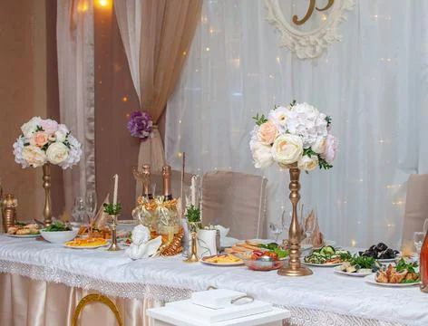 The composition is a decoration of the wedding table. Empty wine glasses on the Stock Photos