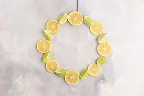 Composition of delicious citrus fruit and green leaves on grey background Stock Photos