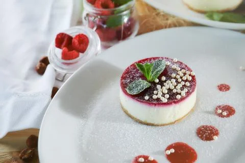 Composition of desserts on a light background. Cakes with fruit and a cup of  Stock Photos