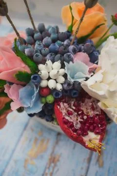Composition of different flowers in a pot Stock Photos