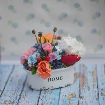 Composition of different flowers in a pot 스톡 사진