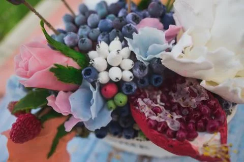 Composition of different flowers in a pot Stock Photos