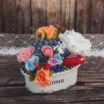 Composition of different flowers in a pot 스톡 사진