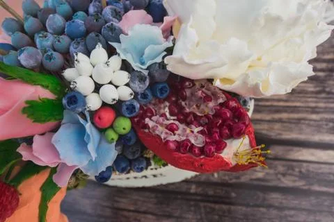 Composition of different flowers in a pot Stock Photos