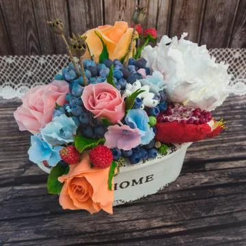 Composition of different flowers in a pot Stock Photos