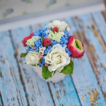 Composition of different flowers in a pot Stock Photos