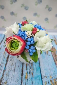 Composition of different flowers in a pot Stock Photos