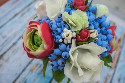 Composition of different flowers in a pot Stock Photos