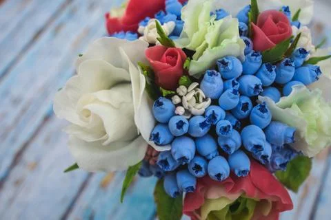 Composition of different flowers in a pot Stock Photos