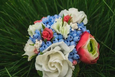 Composition of different flowers in a pot Stock Photos