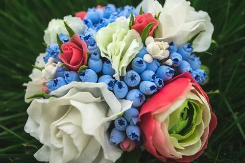 Composition of different flowers in a pot Stock Photos