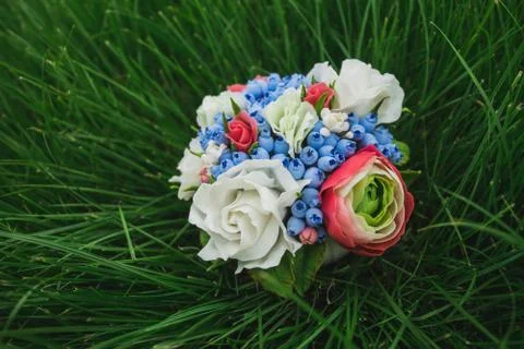 Composition of different flowers in a pot Stock Photos