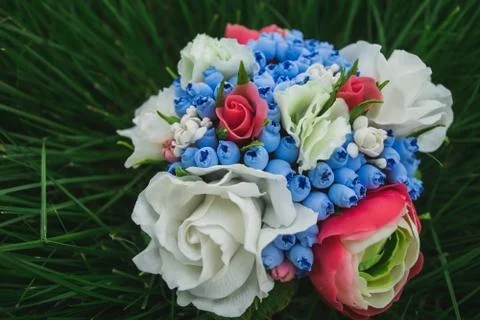 Composition of different flowers in a pot Stock Photos