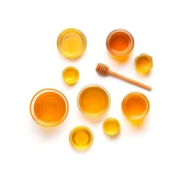 Composition from different jars with honey on isolation top view. Stock Photos