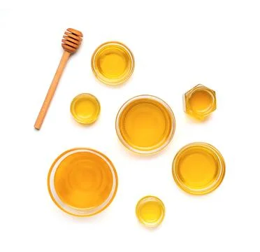 Composition from different jars with honey on isolation top view. Stock Photos