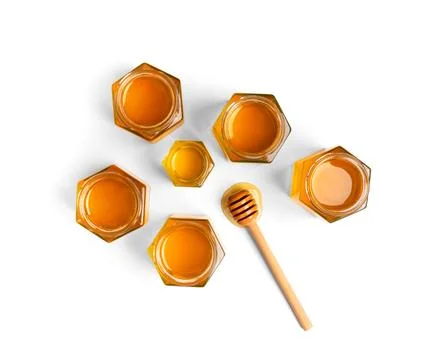 Composition from different jars with honey on isolation. Stock Photos