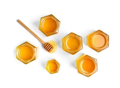 Composition from different jars with honey on isolation. Stock Photos