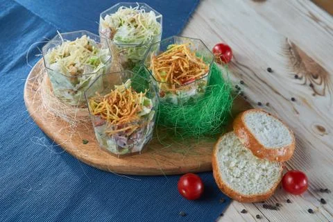 Composition of different mini salads for a picnic on a wooden gloss with a br Stock Photos