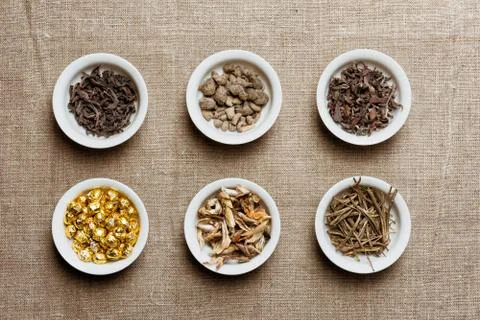 Composition of different natural dry tea leaves Stock Photos