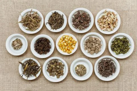 Composition of different natural dry tea leaves Stock Photos