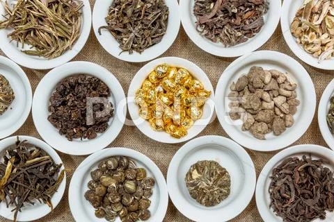 Composition of different natural dry tea leaves Stock Photos
