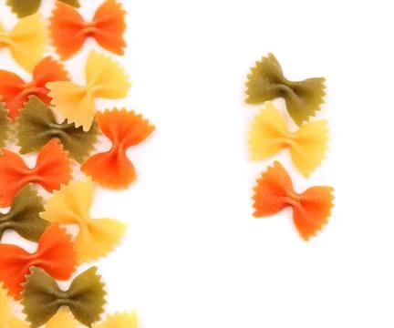 A composition of different pasta in three colors. Stock Photos