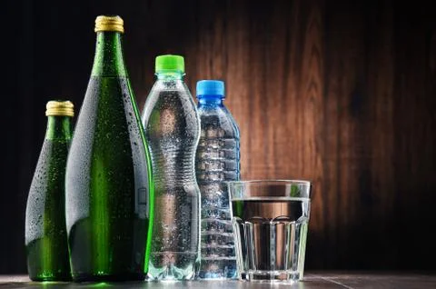 Composition with different sorts of bottles containing mineral water Stock Photos