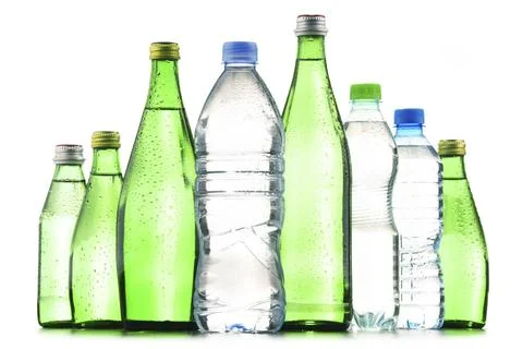Composition with different sorts of bottles containing mineral water isolated on Stock Photos