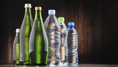 Composition with different sorts of bottles containing mineral water Stock Photos